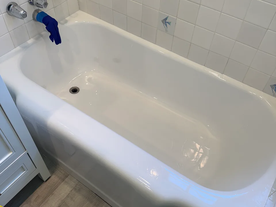 Completely refinished glossy white cast iron bathtub