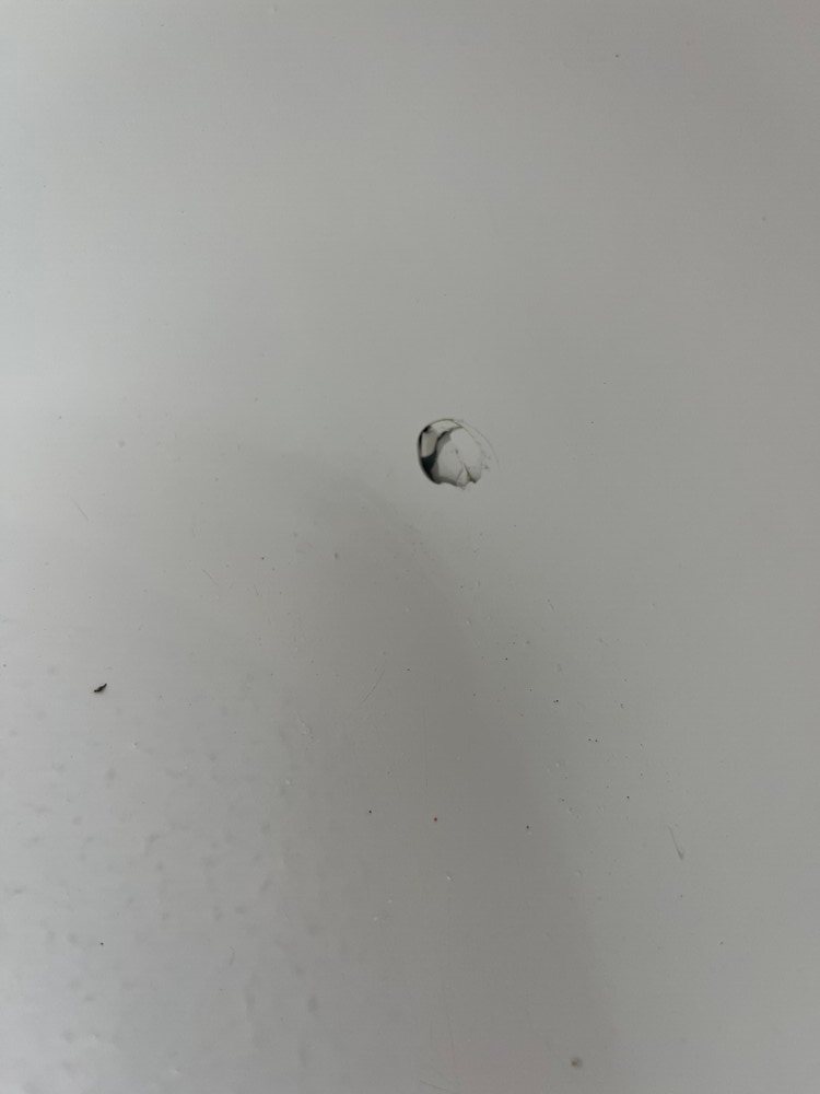 Hole in bathtub surface