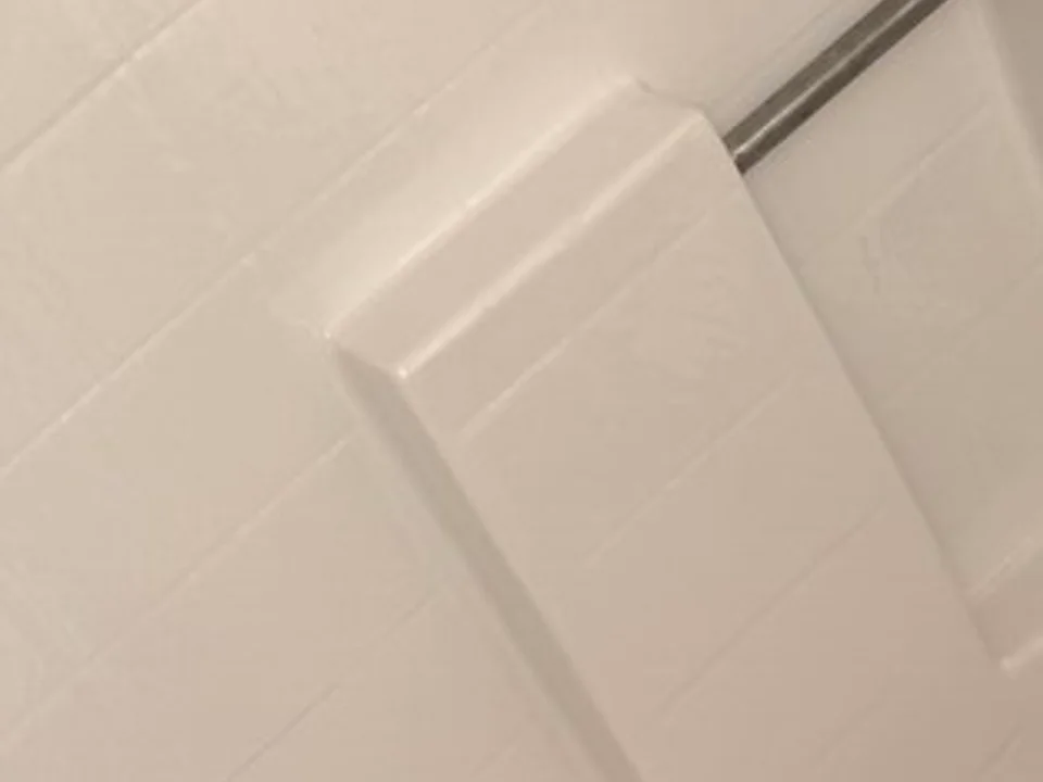 Completely refinished bathtub and walls